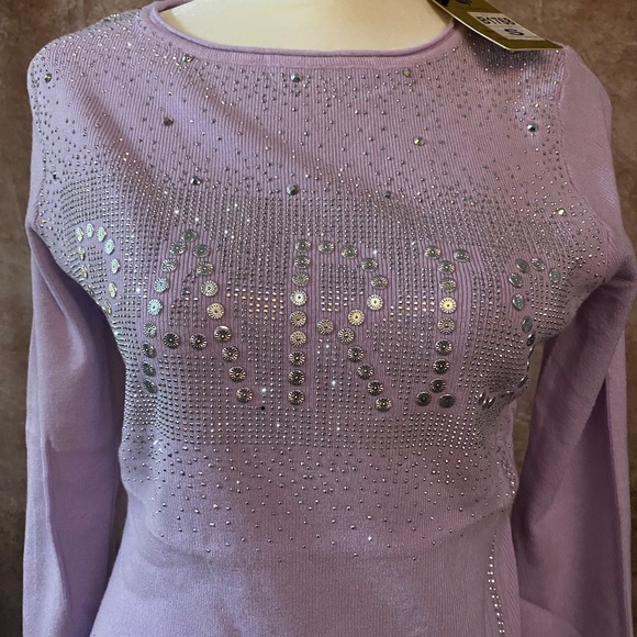 Sweaters - Picture 6 of 9